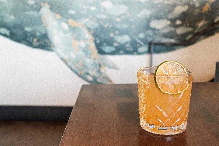 clear drinking glass on brown wooden table